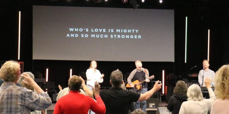 Praying together for teenagers and young adults.