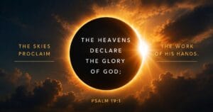 Solar eclipse amid clouds with text: THE SKIES PROCLAIM THE HEAVENS DECLARE THE WORK OF HIS HANDS. THE GLORY OF GOD; PSALM 19:1