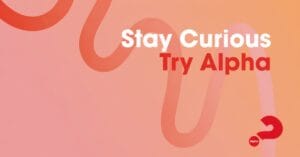 Text reading “Stay Curious Try Alpha” with a red question mark on a pink-orange background