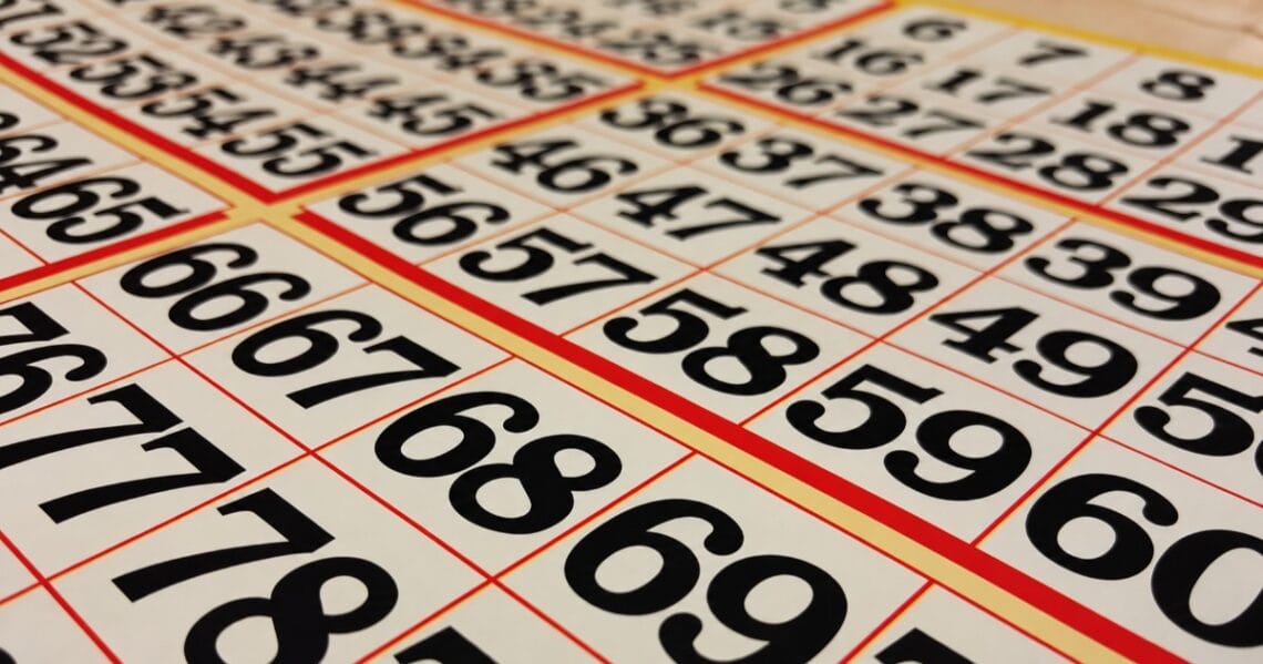 Close-up of calendar pages with large black numbers in red-bordered grids