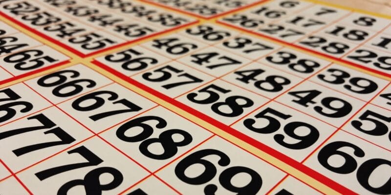 Close-up of calendar pages with large black numbers in red-bordered grids
