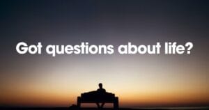 Silhouette of a person sitting on a bench at sunset beneath the text “Got questions about life?”