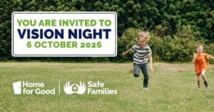 Sign reading YOU ARE INVITED TO VISION NIGHT 6 OCTOBER 2026, with two children running in a field