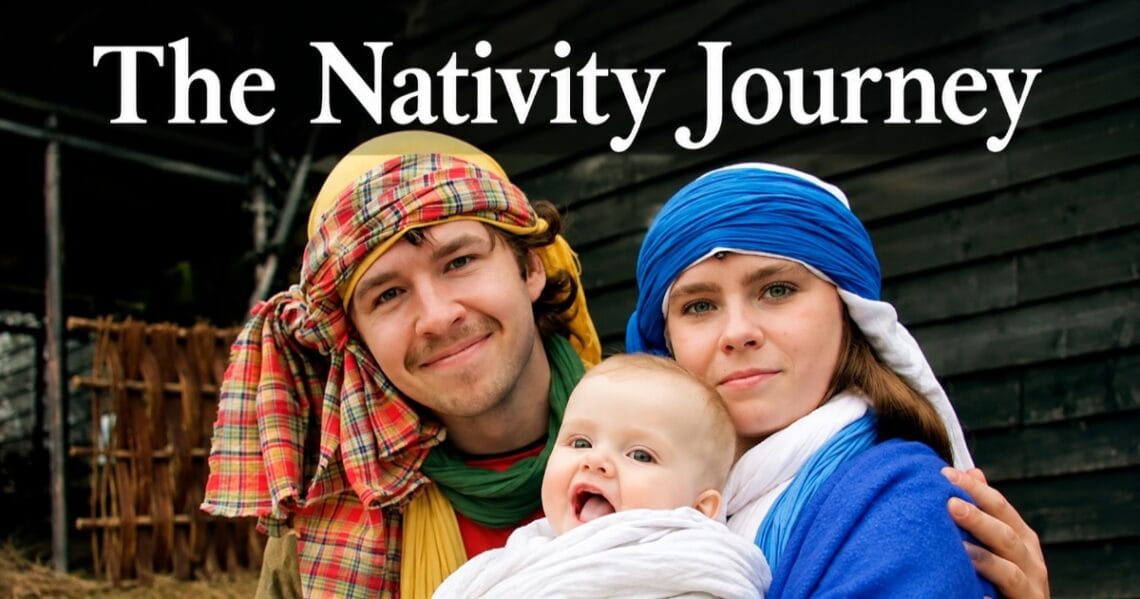 The Nativity Journey: two adults in head coverings with a baby wrapped in white cloth